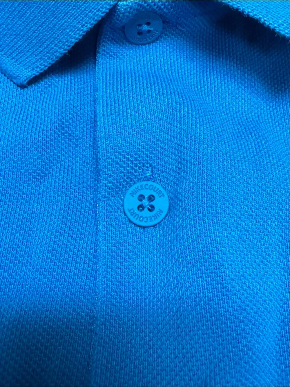 Nike Court Heritage Tennis Blue Polo Shirt with Small Multicolor Crest L